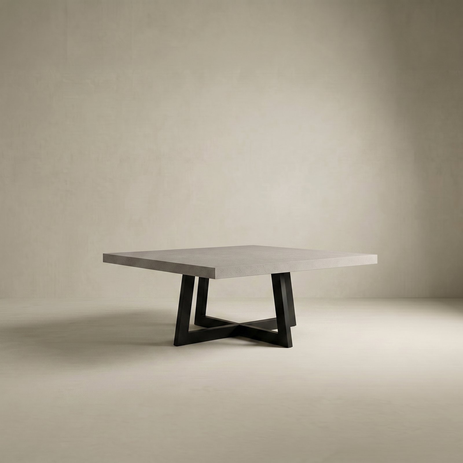 Studio render of the square IronCross concrete dining table on its black steel cross-base on a cream backdrop