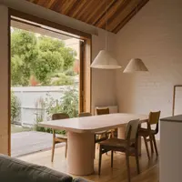 Milano rectangular concrete dining table in Brunswick peach pigment, view 1