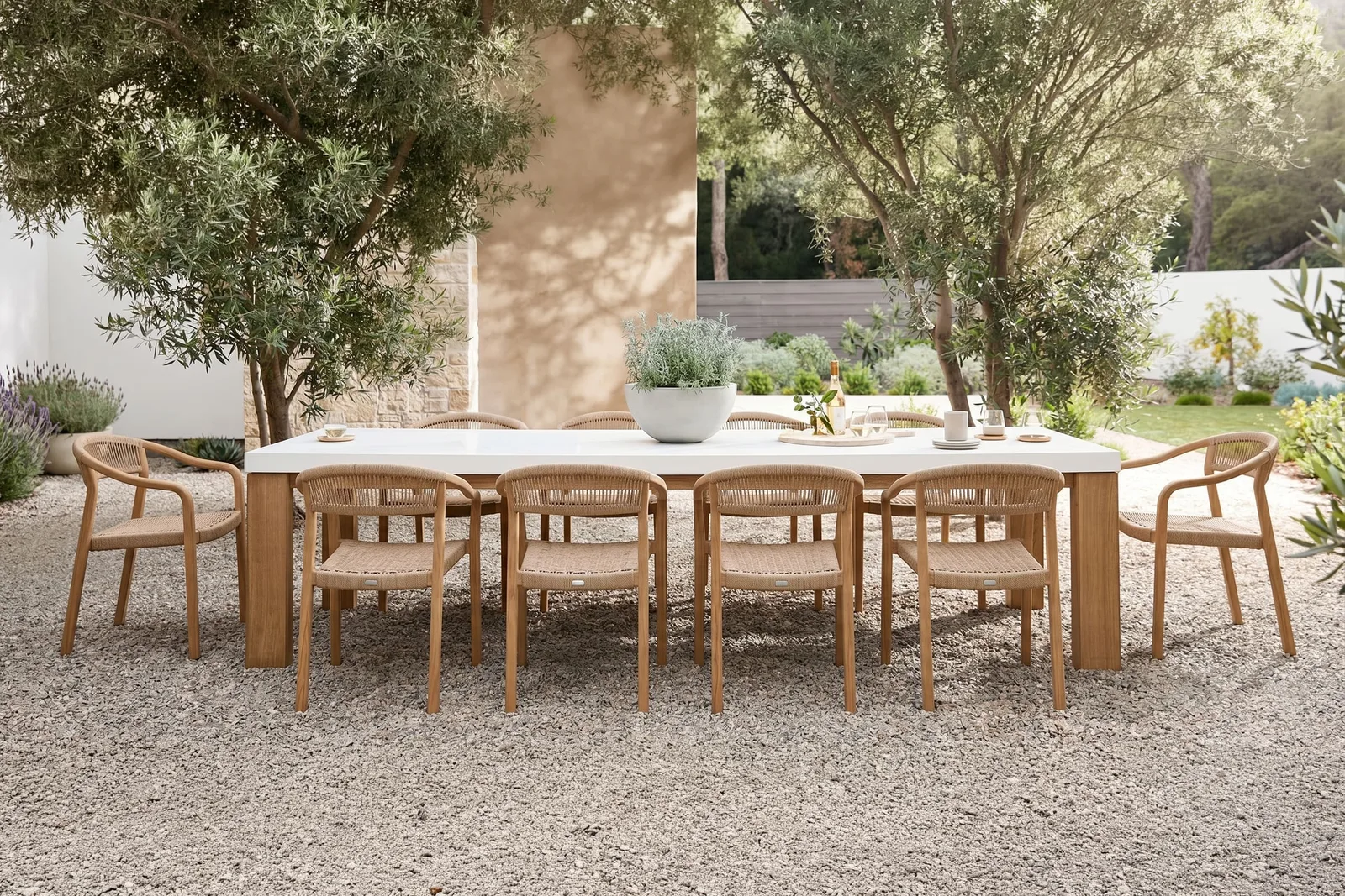 Concrete outdoor dining table and bench seats by SnapCo arranged on a paved Australian terrace