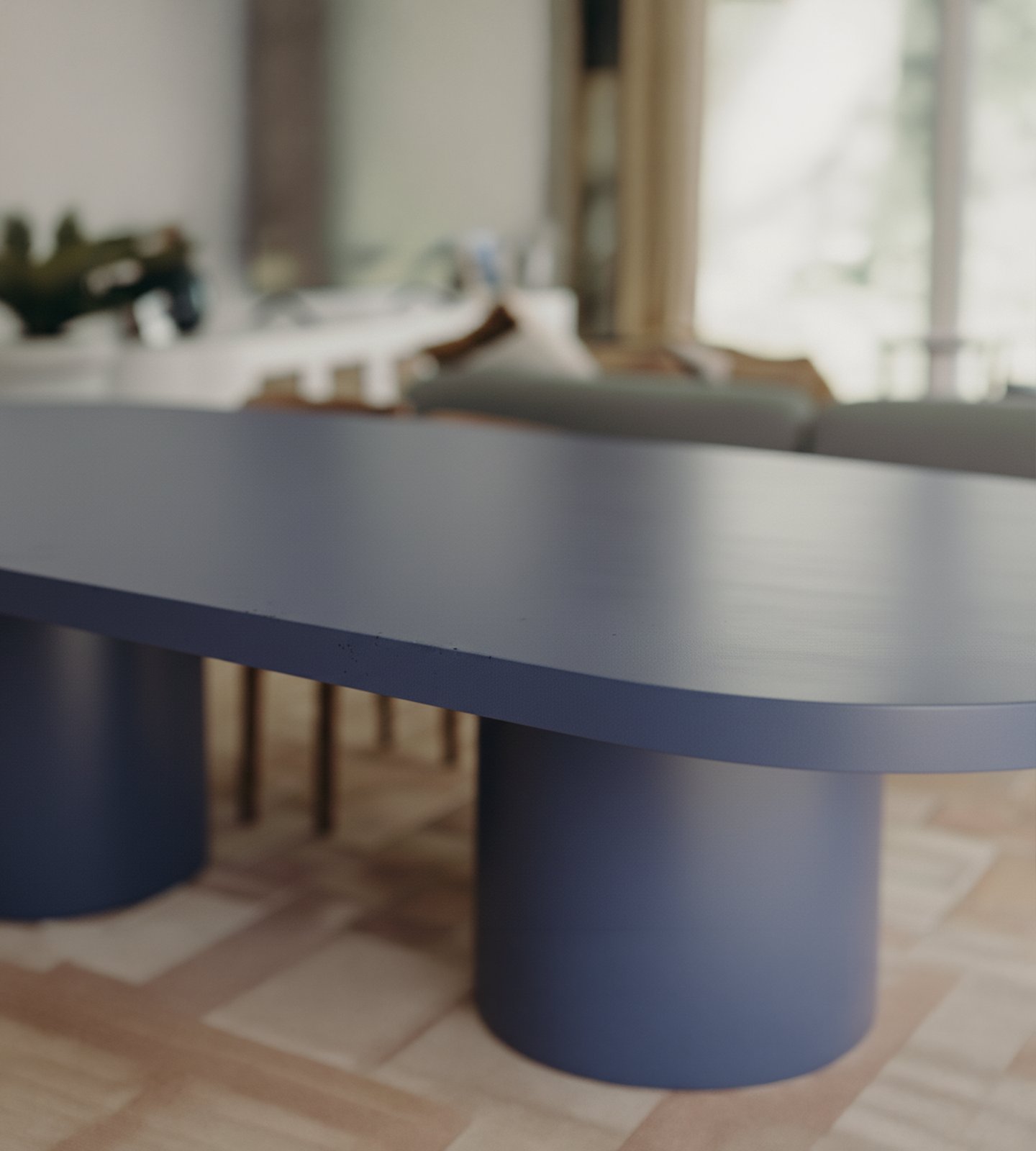 Navy Palermo oval concrete dining table close-up showing the cast edge and twin pedestal base