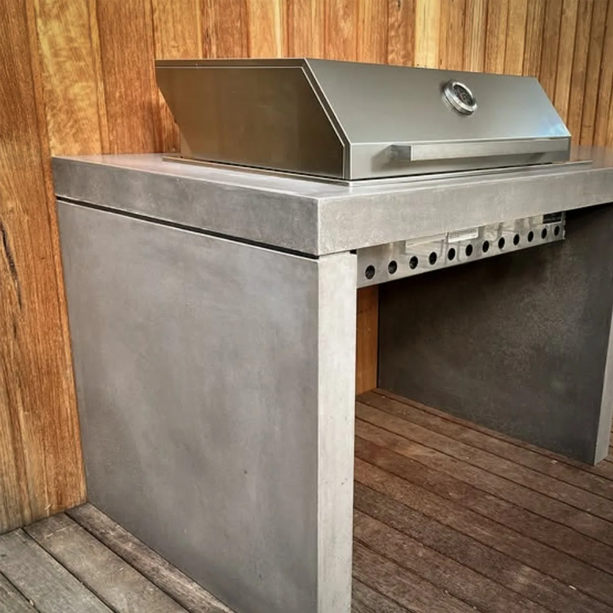 Concrete outdoor kitchen benchtop by SnapCo with cast-in BBQ cut-out, hand-cast in Mordialloc for poolside and alfresco kitchens