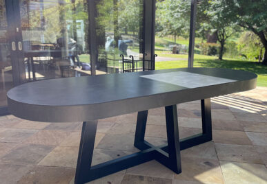 IronCross Oval Concrete Dining Table
