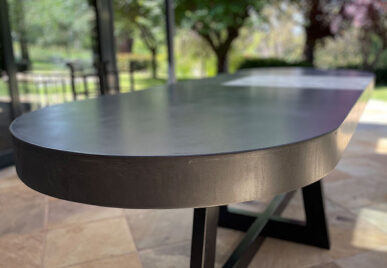 IronCross Oval Concrete Dining Table